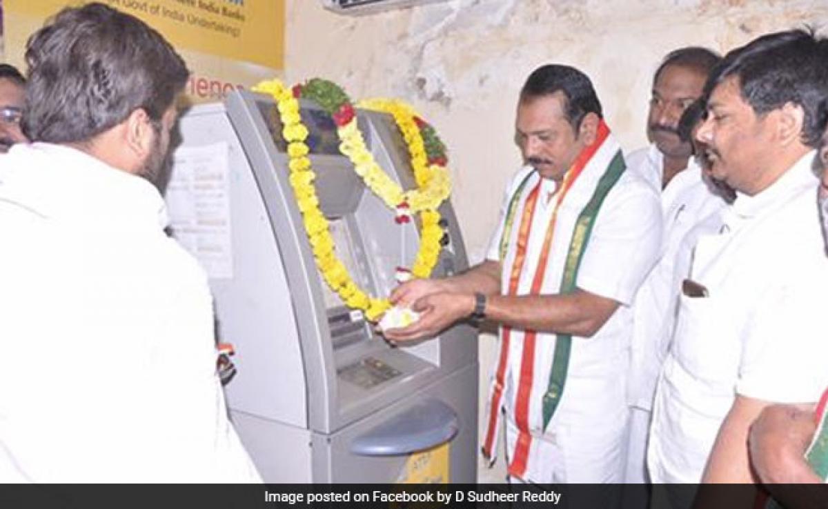 Congress leader Sudheer Reddy performs puja at ATM