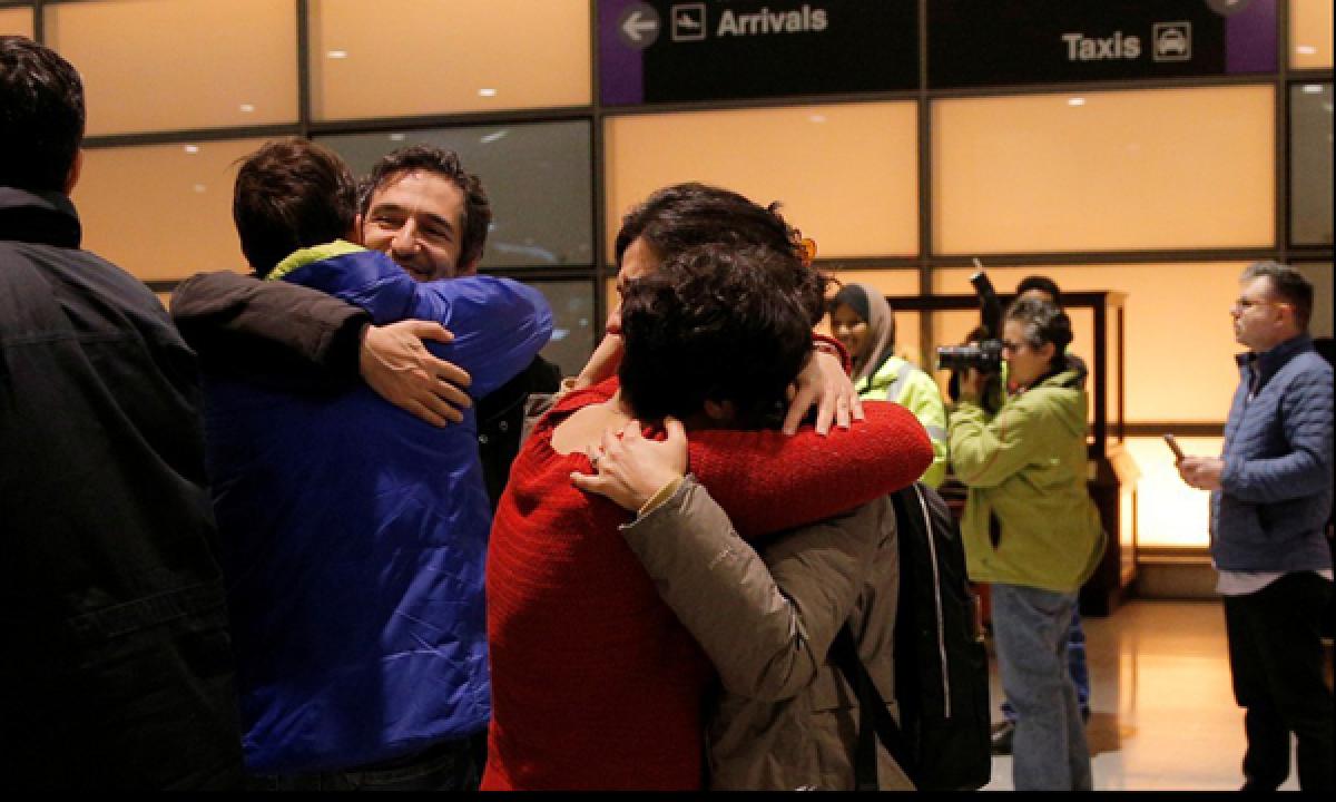 Graduate Iranian student returns to US after judge halts the travel ban order