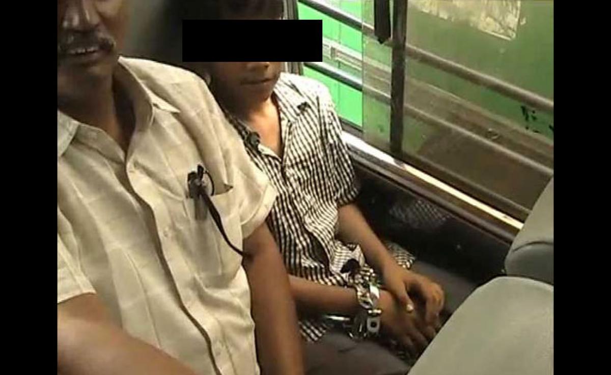 Minor handcuffed causes stir in Telangana