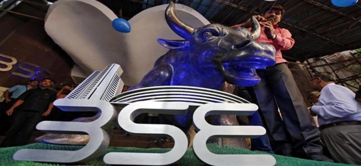 Sensex eases from record highs