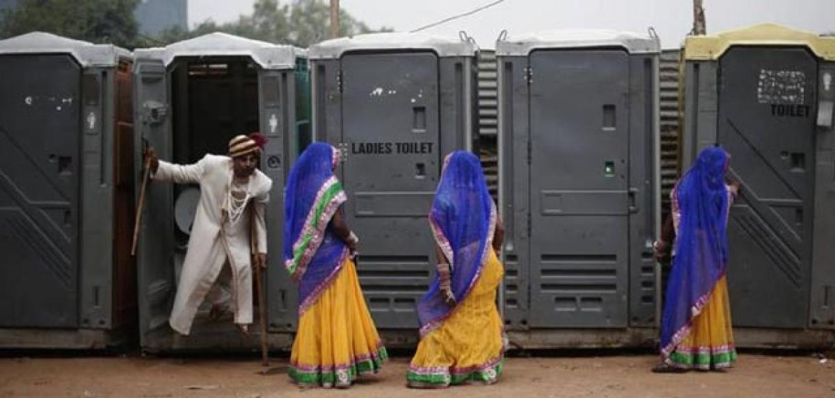 A different protest by girl students for construction of toilets 