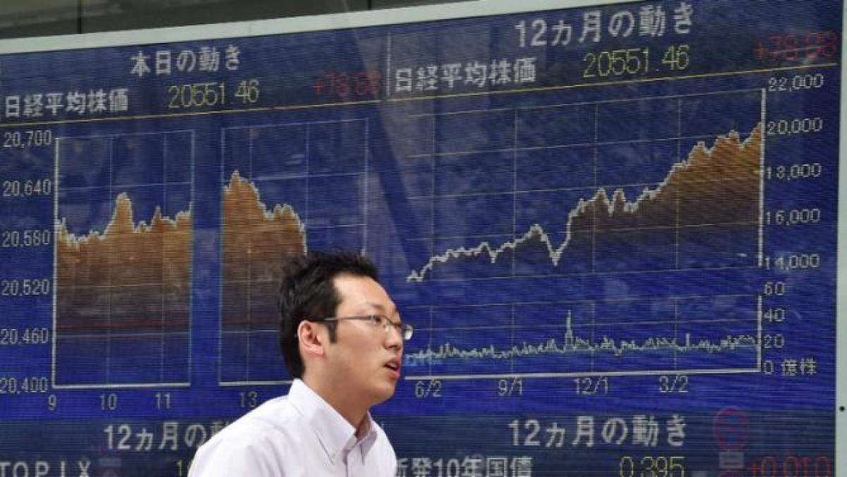 Tokyo shares rise by break following US market rebound