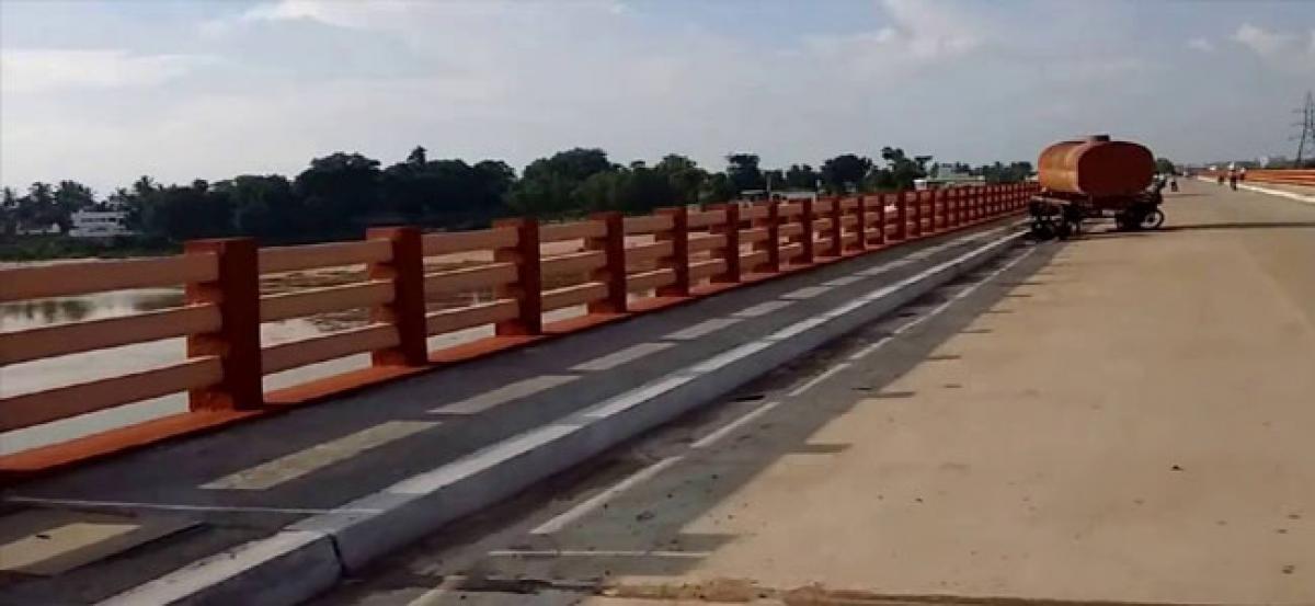 Government flayed for delay in road-bridge construction
