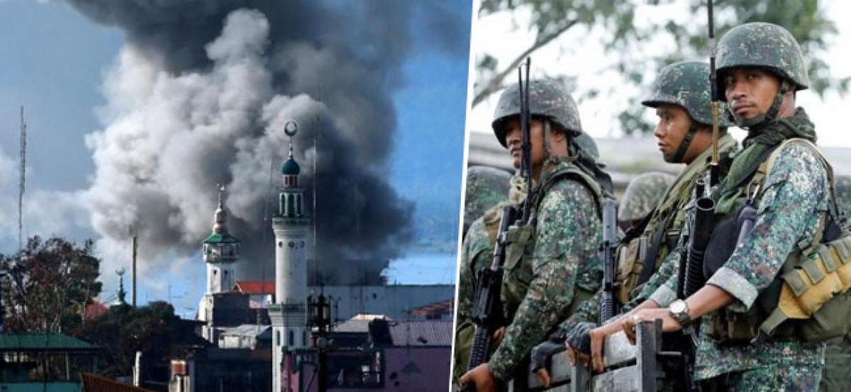 Hostages in Philippines siege forced to fight, loot, become sex slaves - army