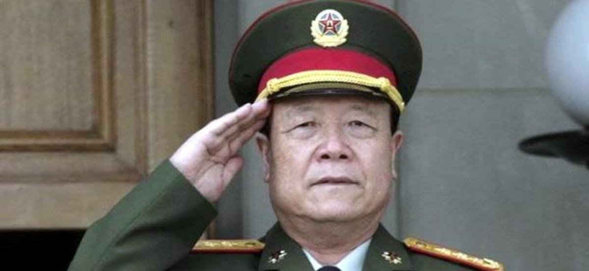 China jails former top military officer for life in graft case