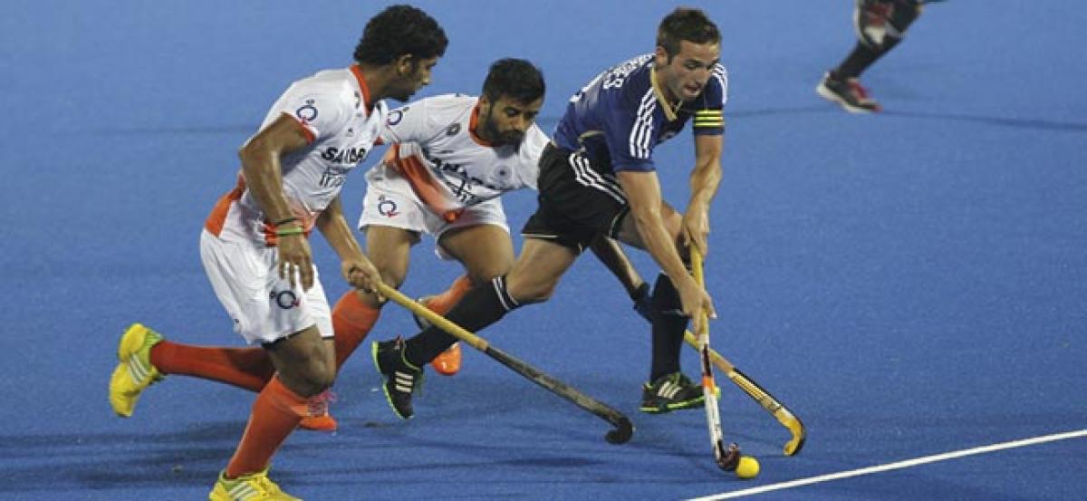 India hold Argentina 3-3 in six-nation hockey tournament.