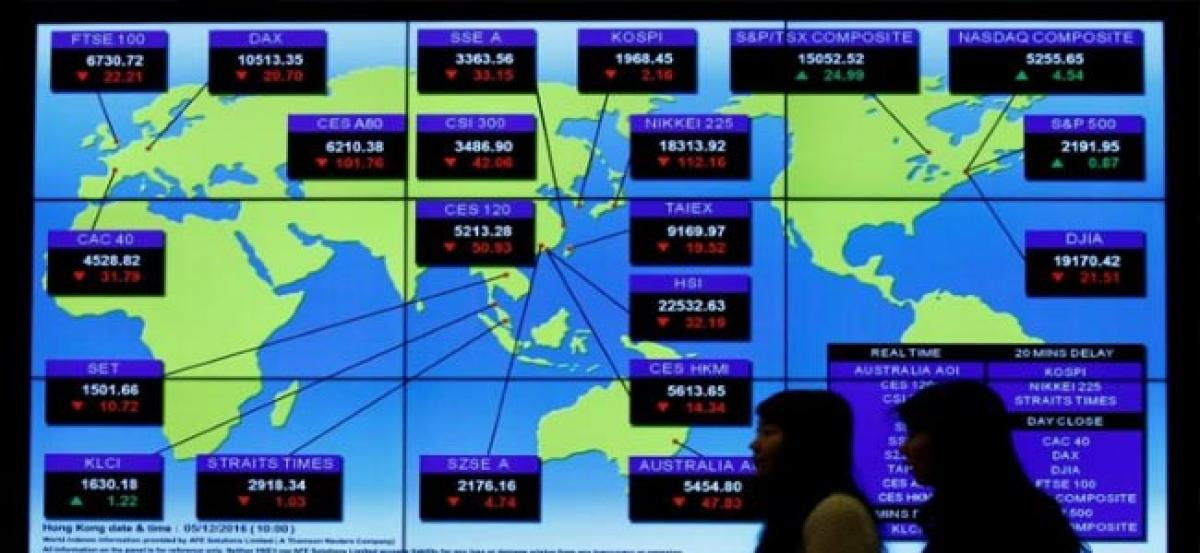 Asia stocks mostly higher, dollar claws back some losses