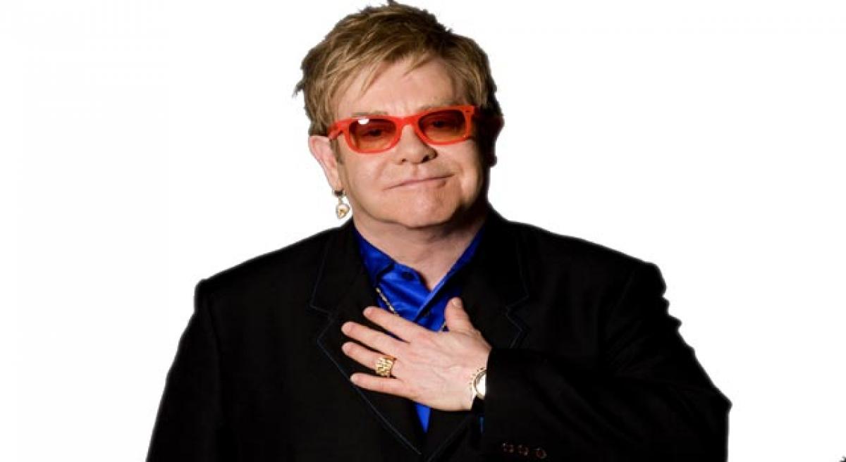 Elton John recovering after hospitalization