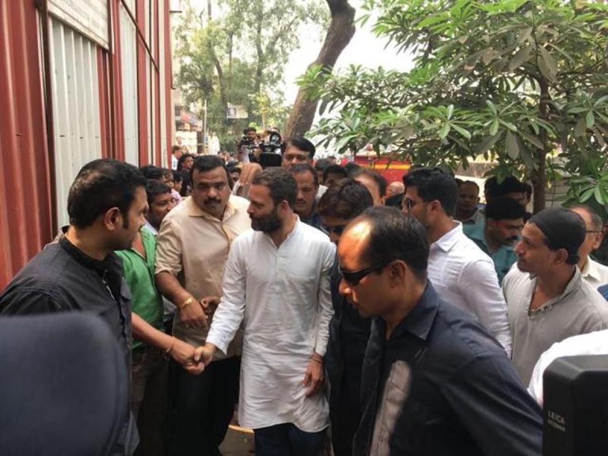 Rahul interacts with people in ATM queue, says currency spike to help PMs friends