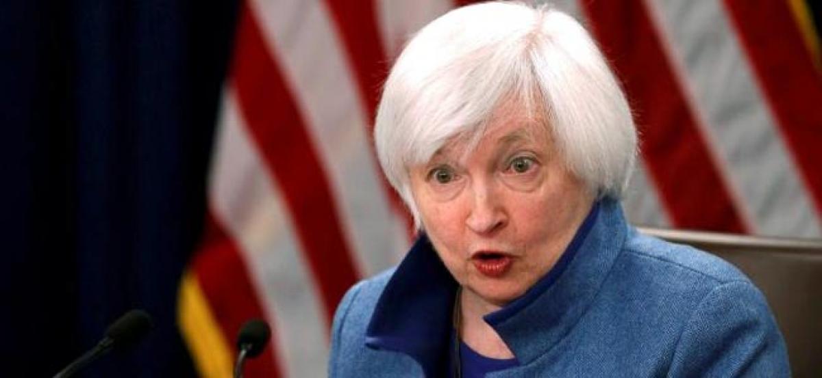 Fed leaves interest rates unchanged, remains upbeat on economy