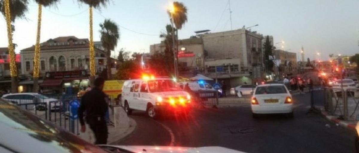 Female cop critically injured in coordinated shooting, stabbing attack in Jerusalem