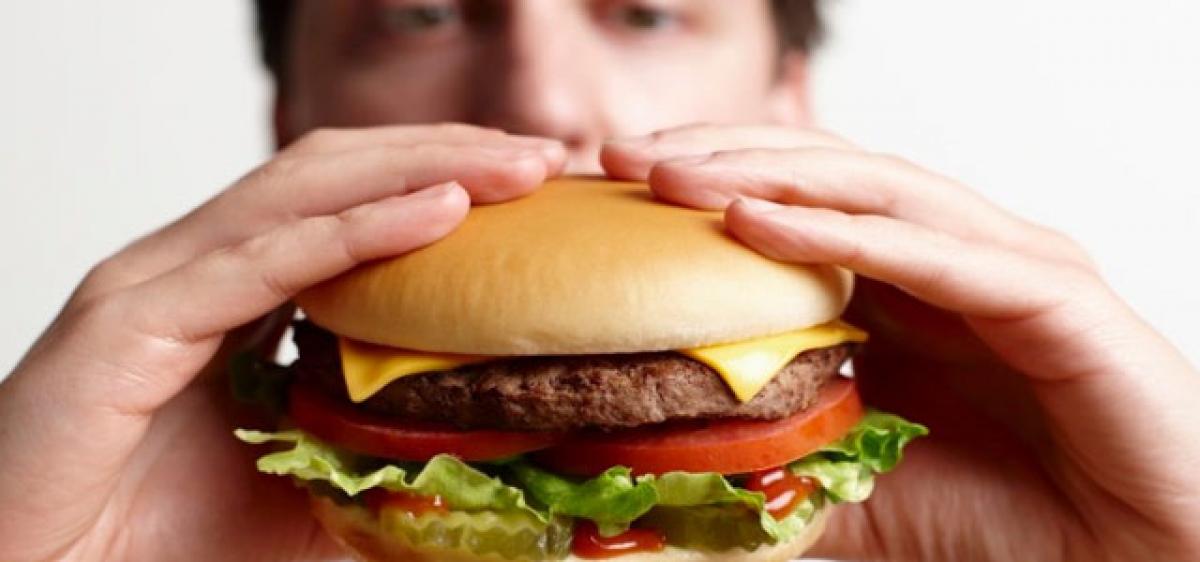 Cannot cut burgers, pizzas from diet? Blame your genes