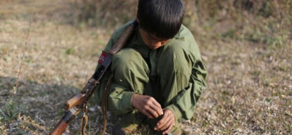 Exclusive - Overruling diplomats, U.S. to drop Iraq, Myanmar from child soldiers list