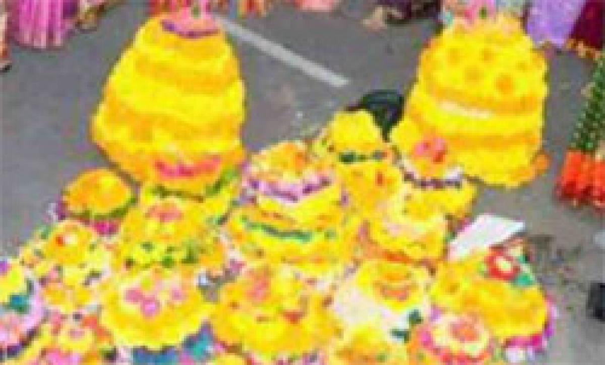 Farmers rush to purchase Bathukamma