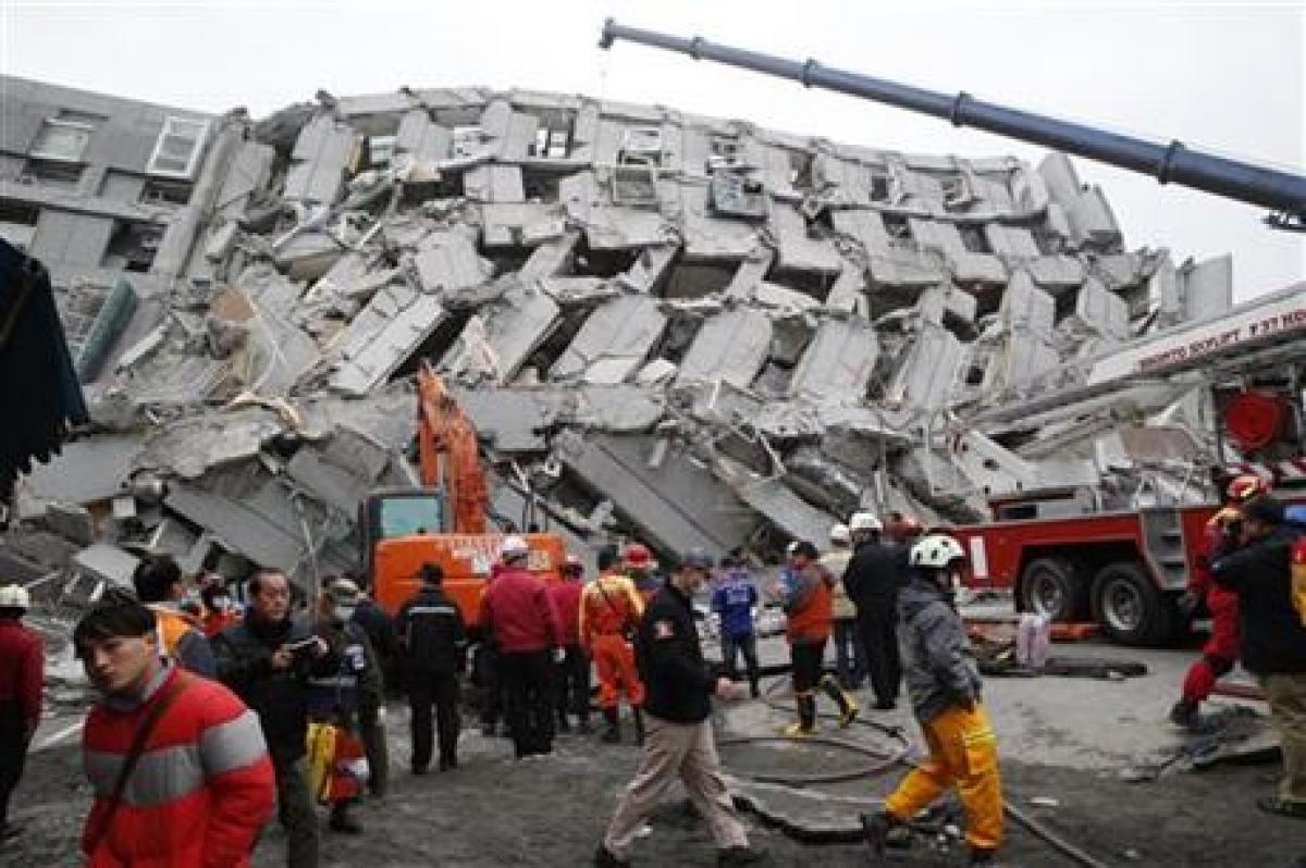 Man pulled out alive after Taiwan quake, more than 130 people still trapped