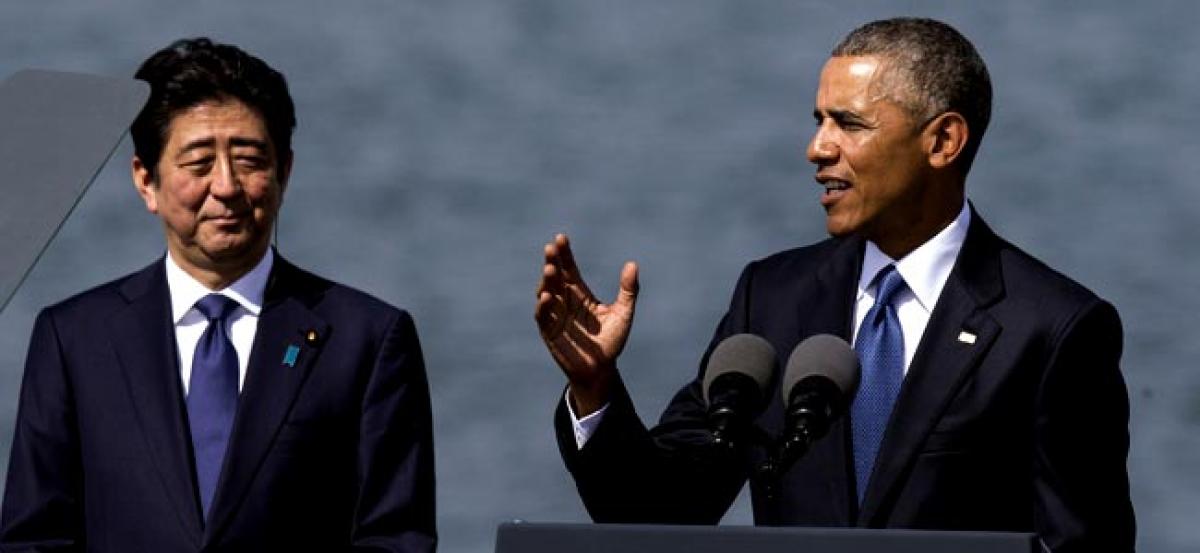 Barack Obama, Shinzo Abe hail reconciliation in Pearl Harbor visit