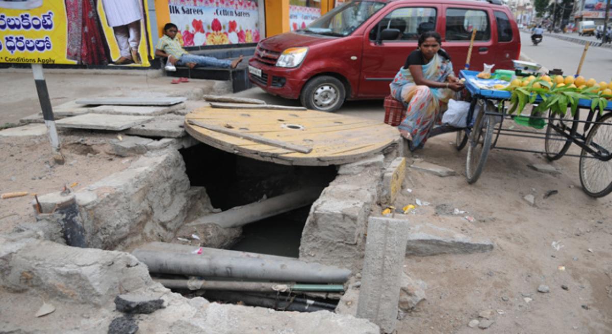 This drain at Malkajgiri grave threat to residents