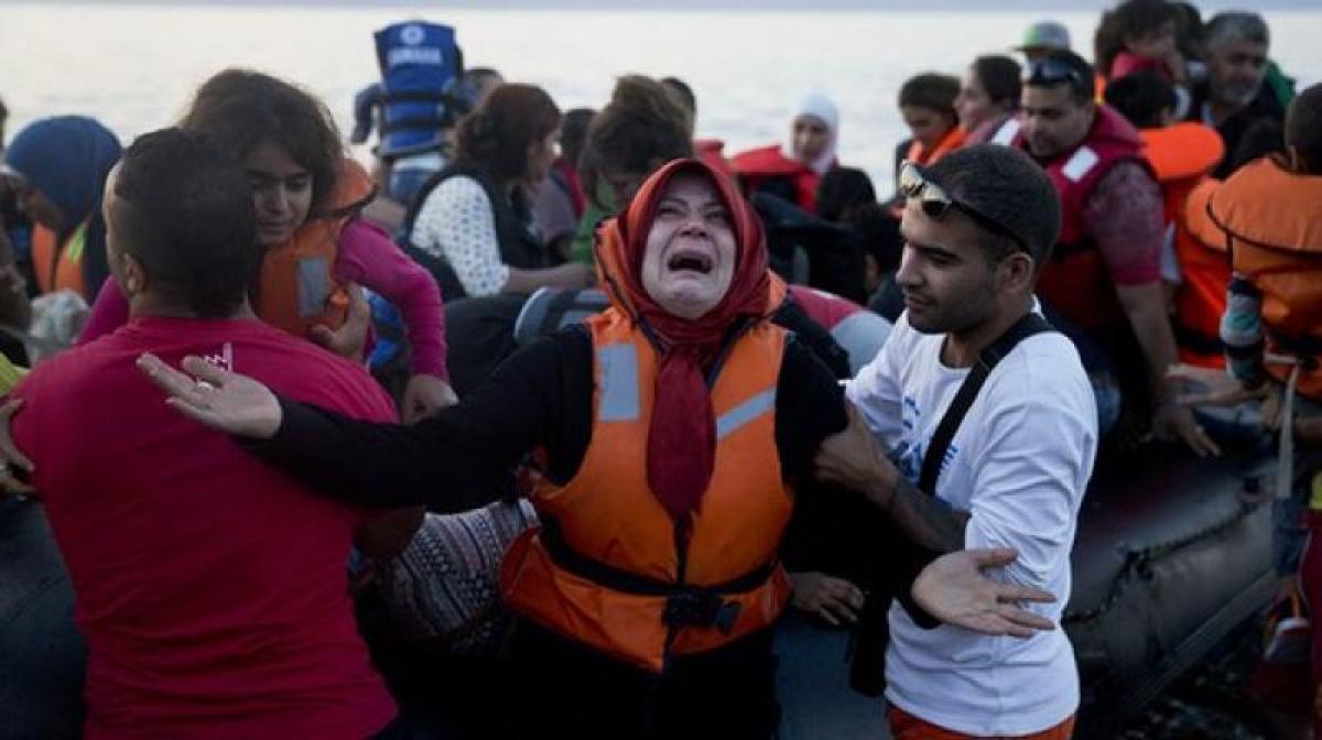 Rescued refugees say ship sank off Italy with hundreds aboard