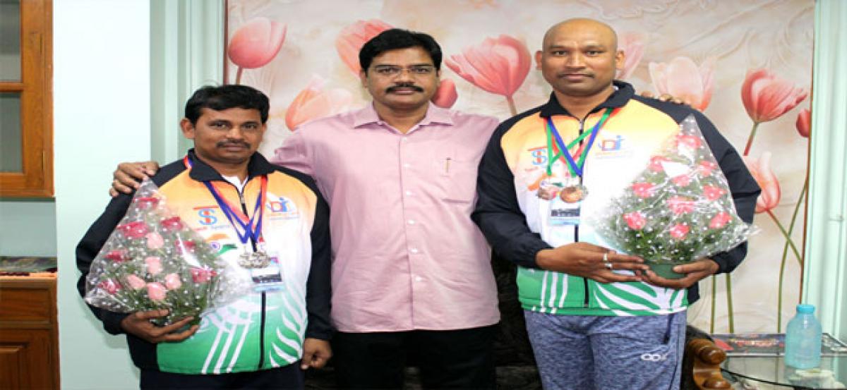 Bhashyam Blooms swimming coaches patted