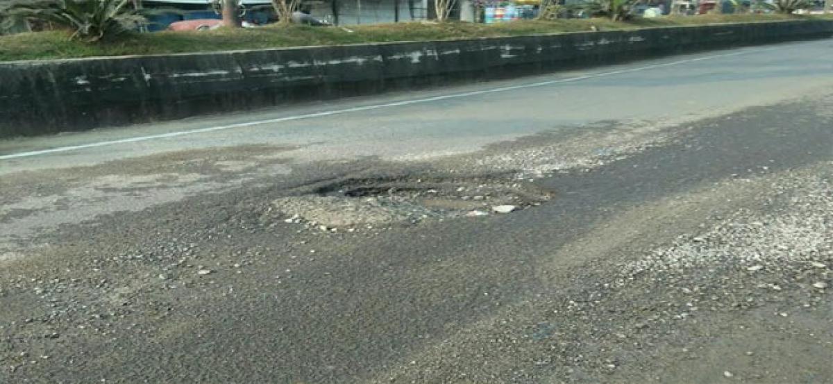 Pothole on road troubles vehicle riders