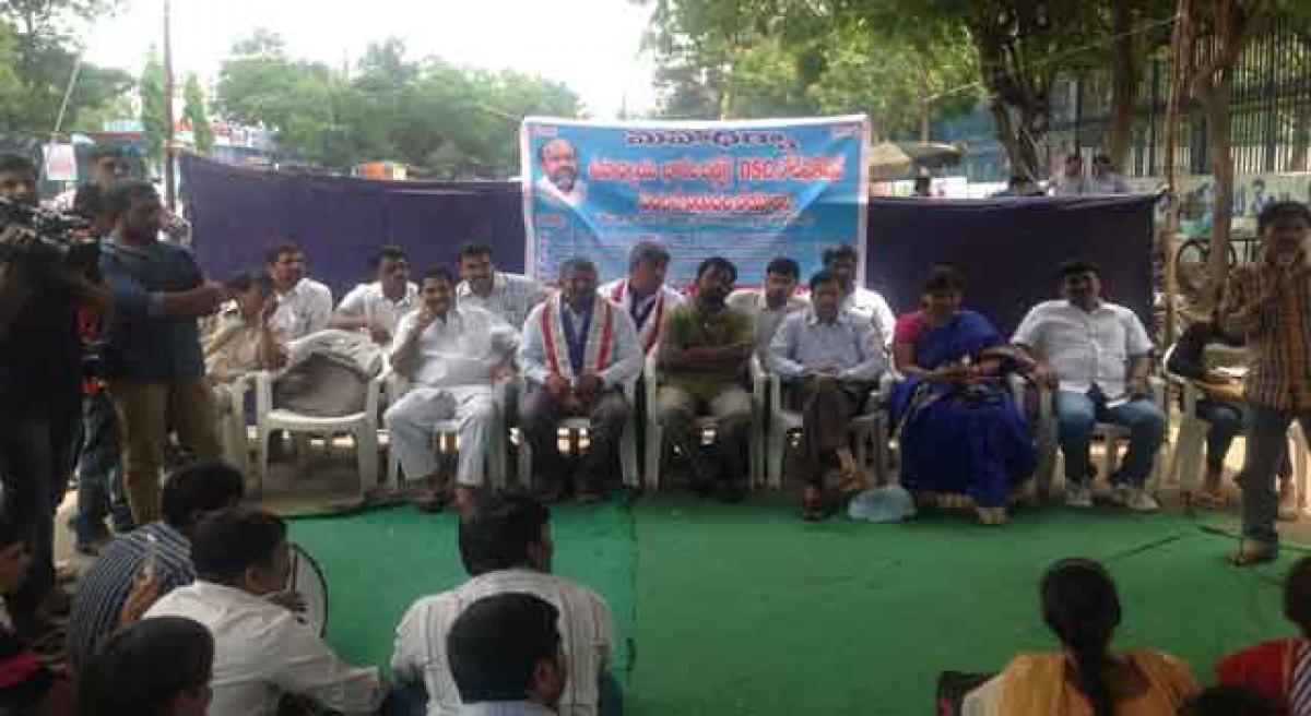 Dharna organised for issuance of DSC notification