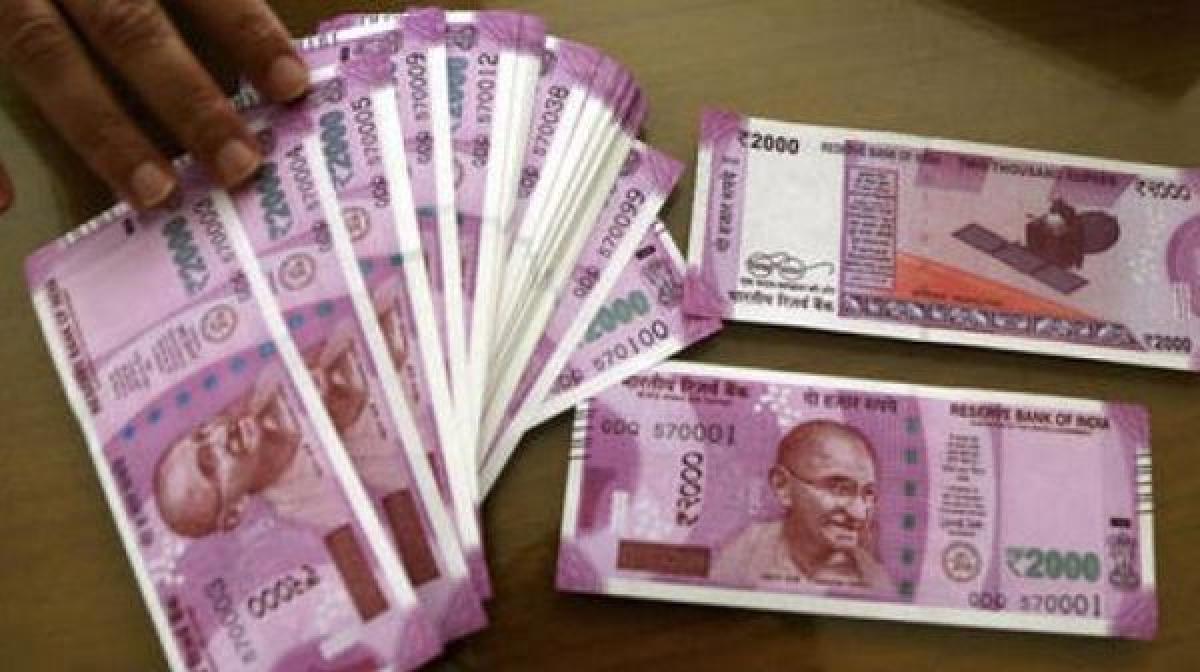 8 held with unaccounted cash of Rs 58 lakh in new Rs 2,000 notes