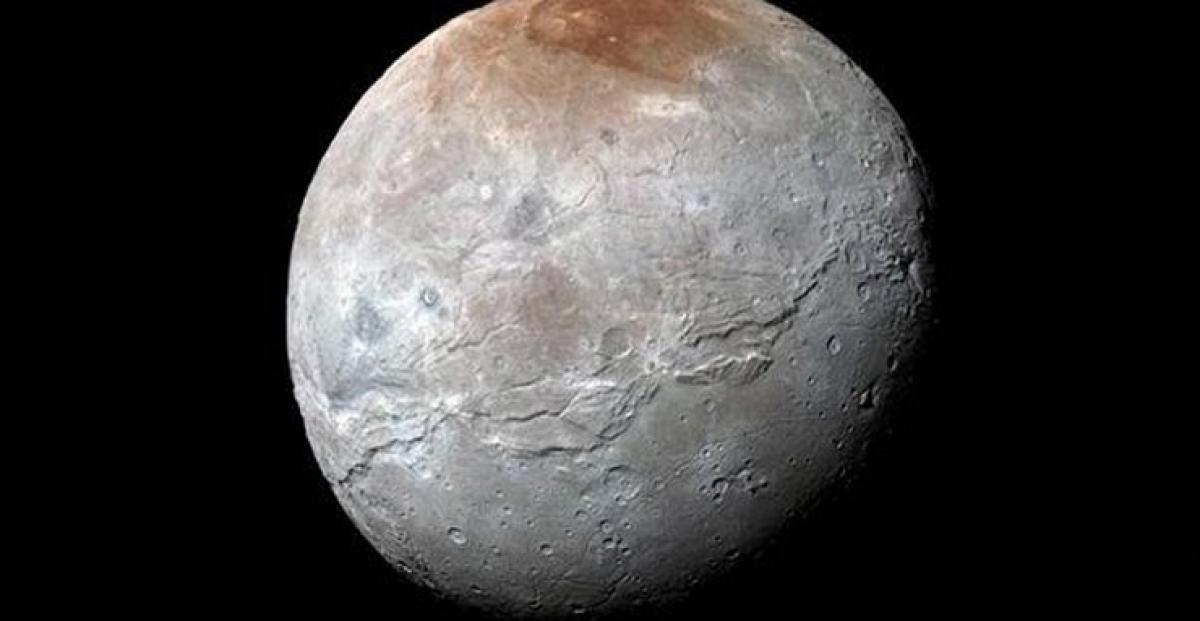NASA captures Plutos moon Charon in stunning detail
