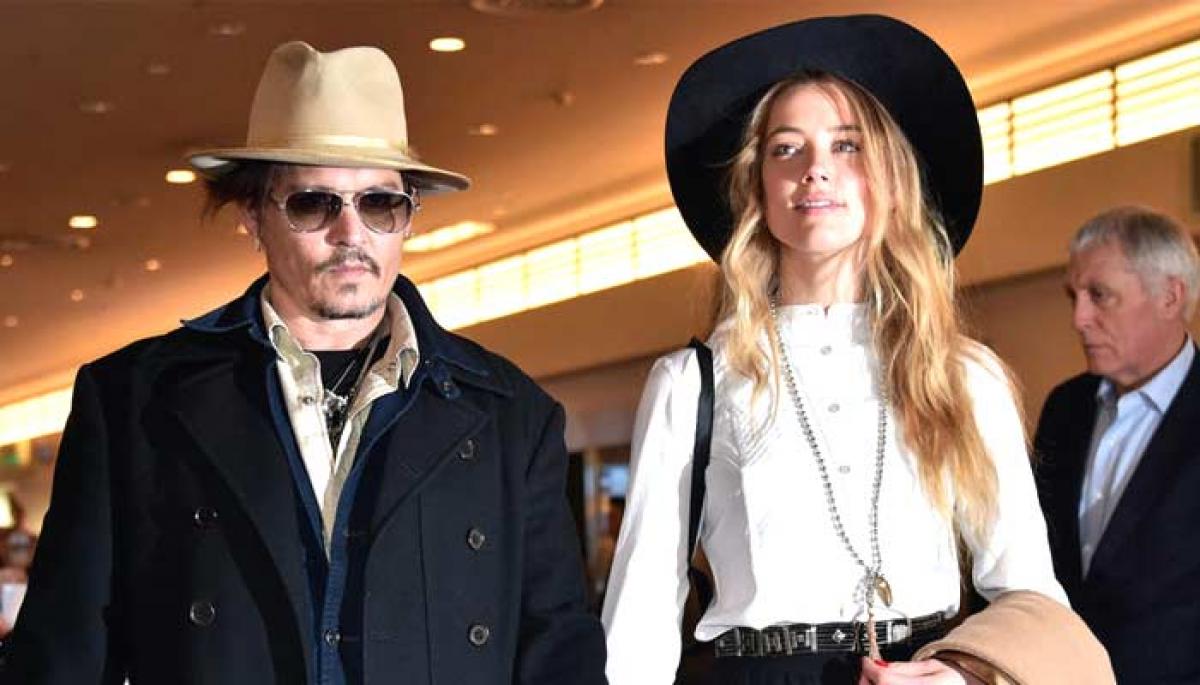 Dogged Johnny Depp ready to hit for Amber Heard