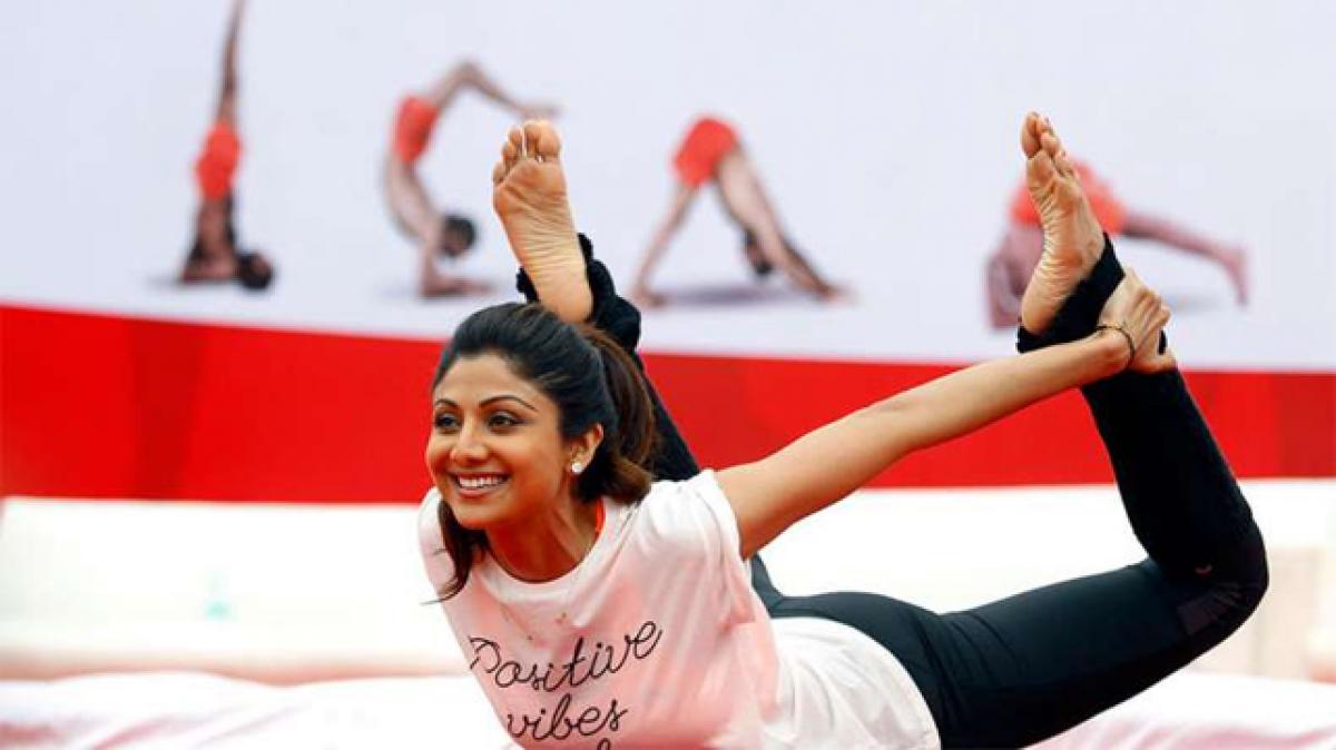 B-Town celebrates historical International Yoga Day