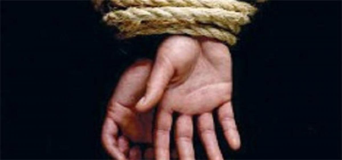 Son kidnaps, tortures father for property