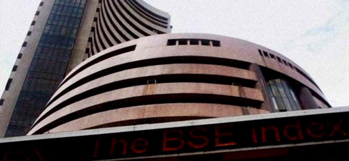 Equities provisionally close flat on global cues