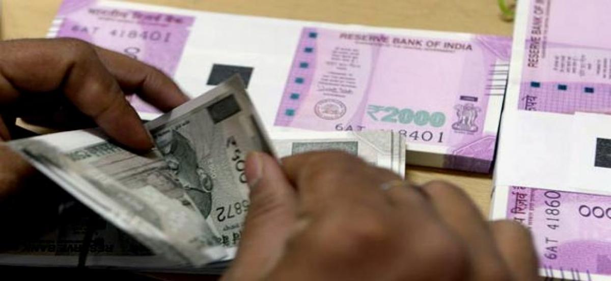 Rupee to weaken to record low over the coming year - Reuters poll