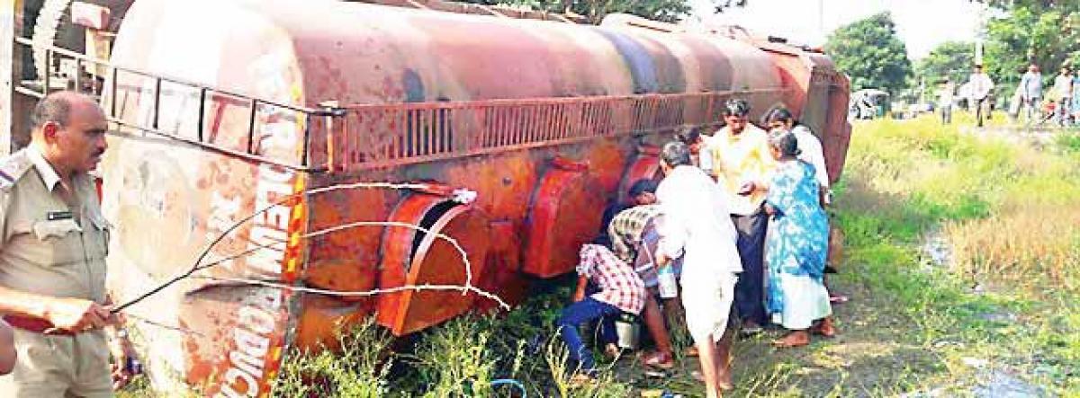 Cooking oil goes down the drain as lorry overturns