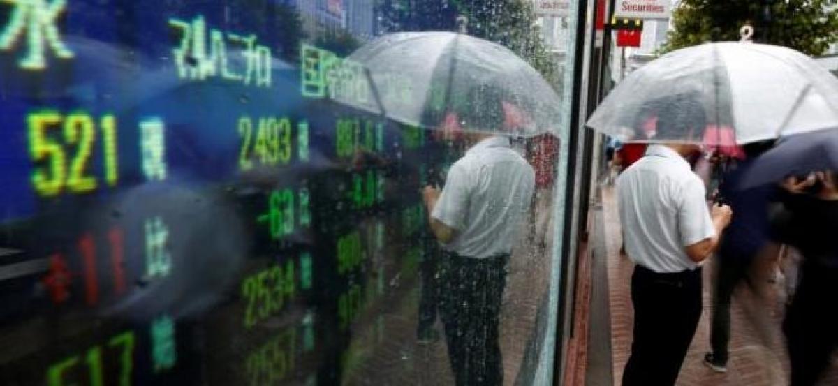 Asia shares hug one-year high, China imports revive