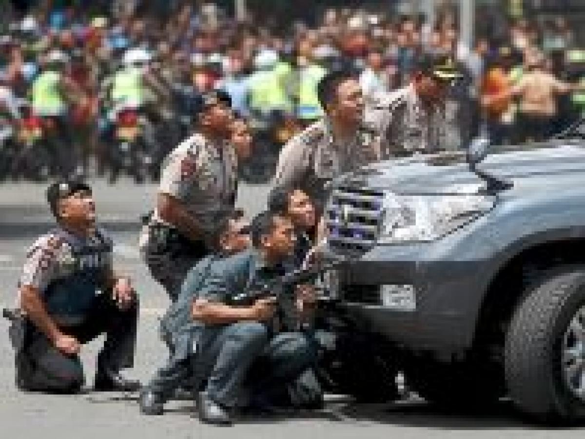 Indonesia on security alert as police probe attacks