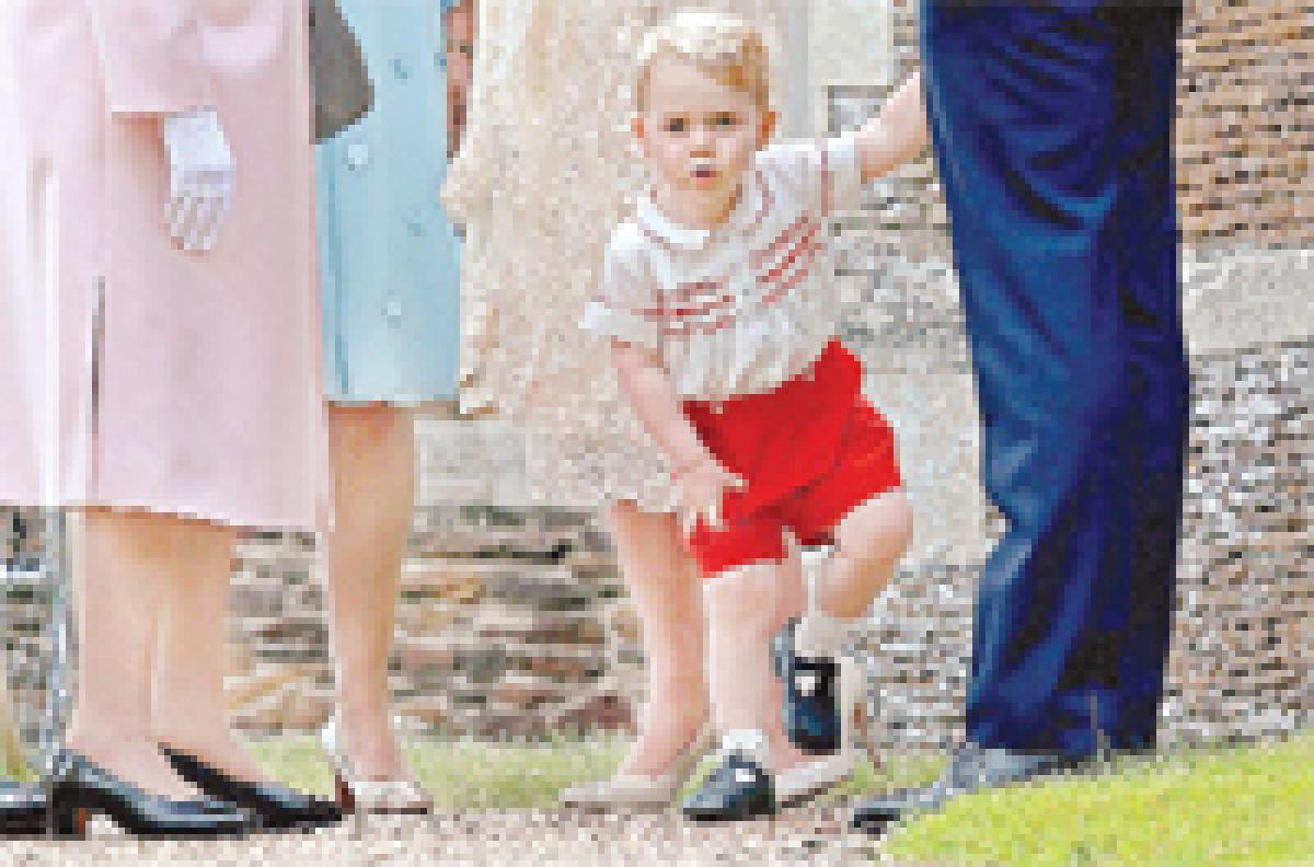 Prince George’s christening outfit a big hit