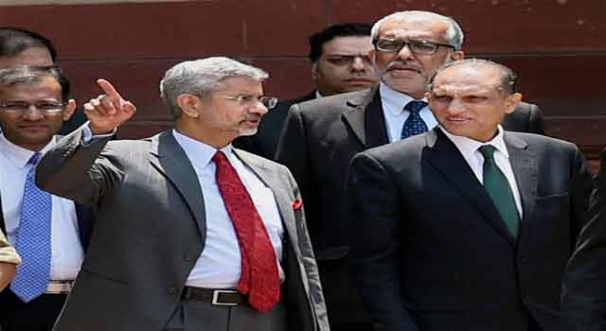 India asks Pak to take visible action on terror