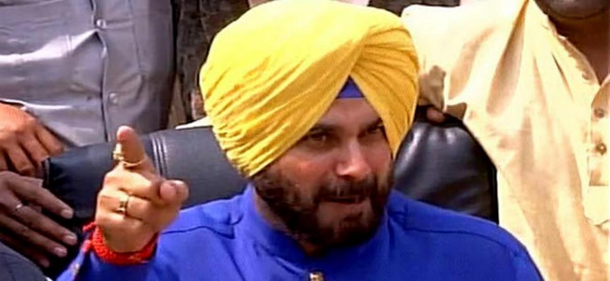 Ex-cricketer Sidhu takes charge as Punjab minister