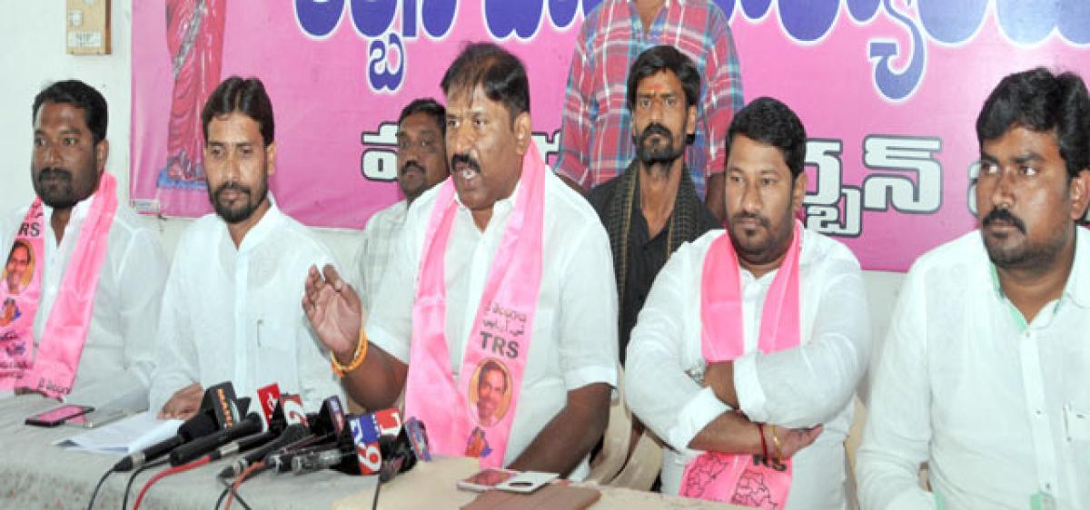 TRS dares Cong to debate on development