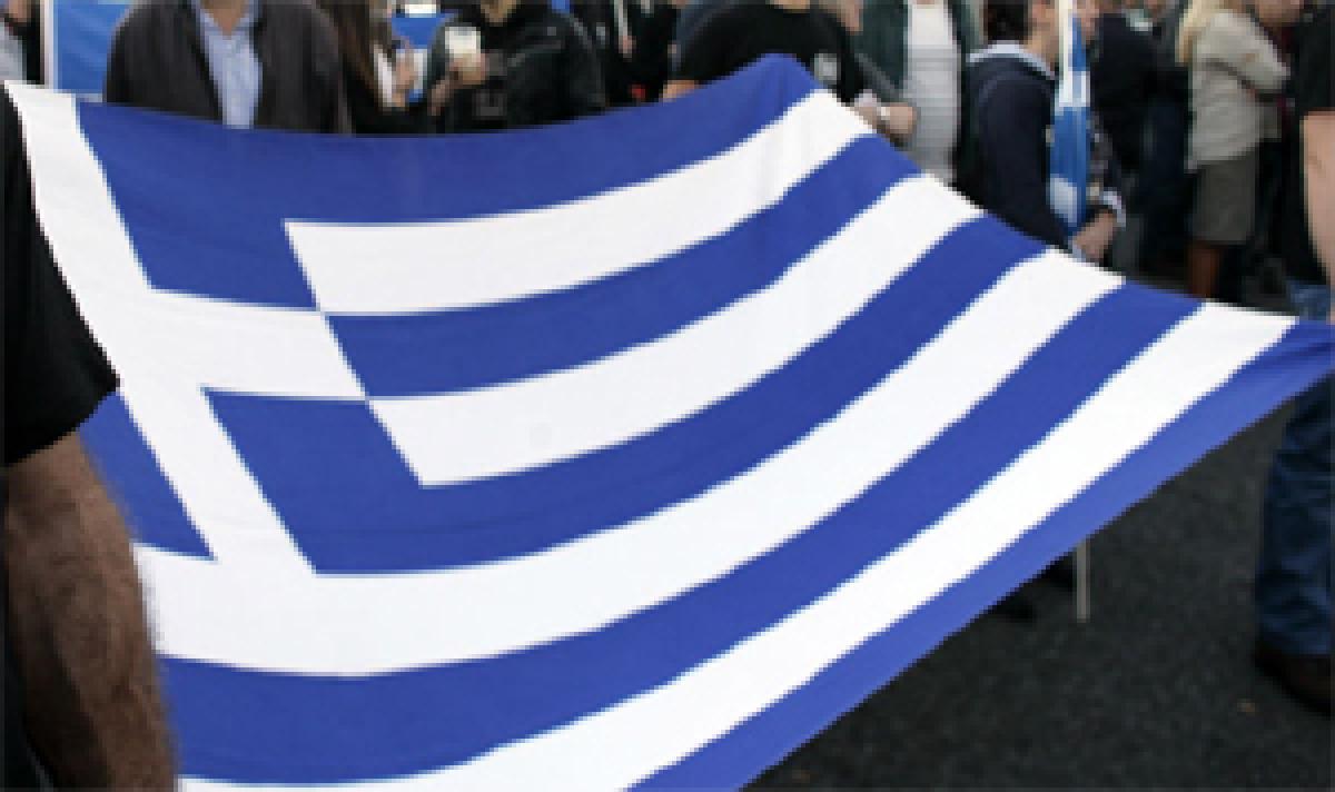 Greek parliament authorises government to negotiate proposal