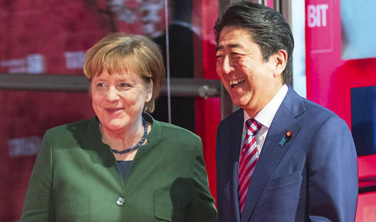 Merkel, Abe call for EU-Japan free trade deal