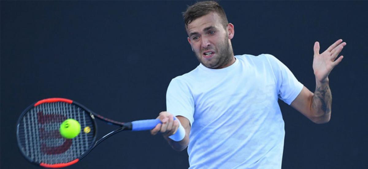 Evans ousts Cilic, Kerber struggles