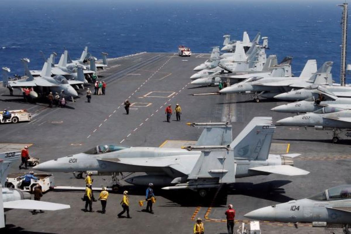 North Korea warns of merciless strikes as US carrier joins South Korea drills