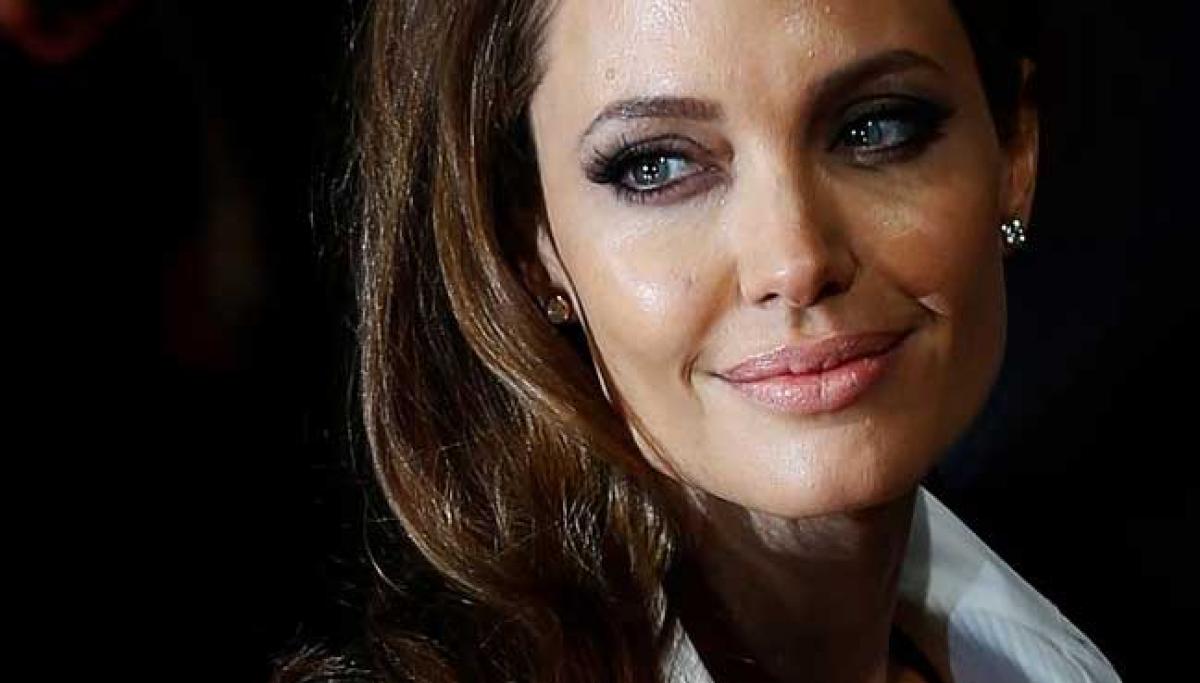 Angelina Jolie slams Trump travel ban, calls for compassionate America