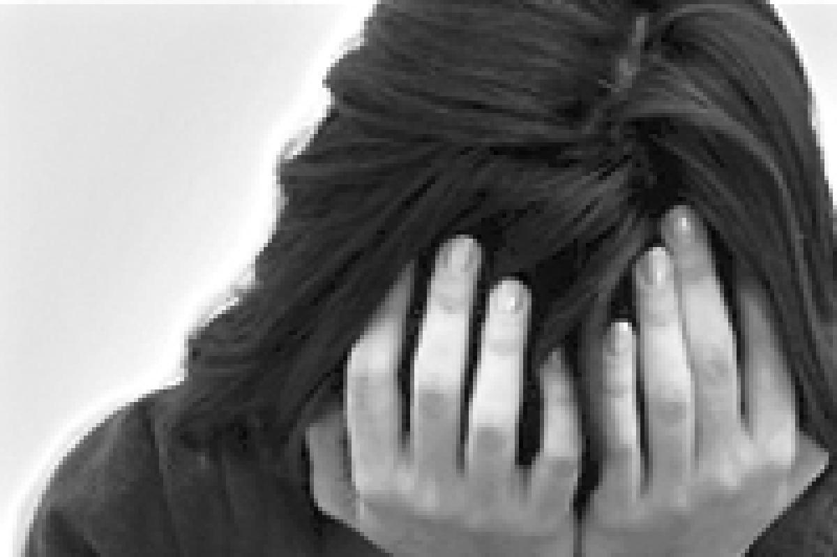 Teen gang-raped in front of parents