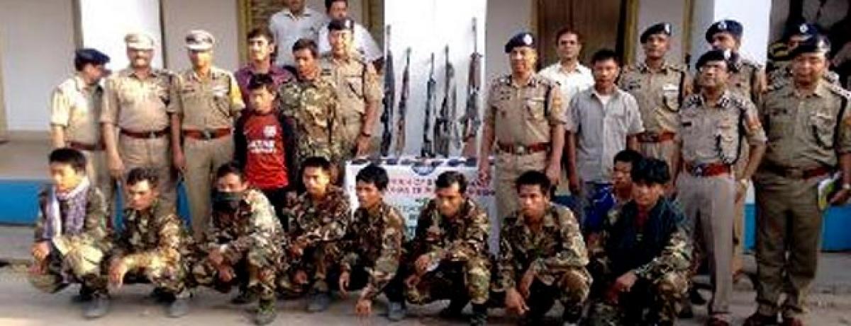 12 NLFT militants surrender with families in Tripura