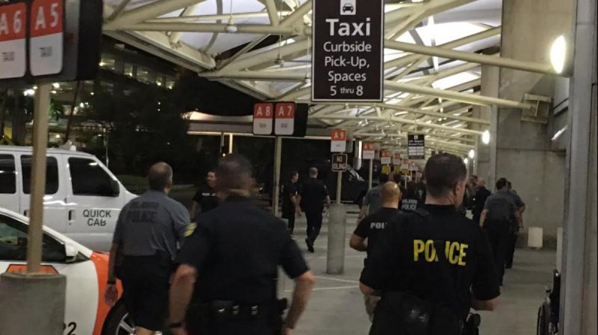 After 3-hour standoff, armed man in custody at Orlando airport