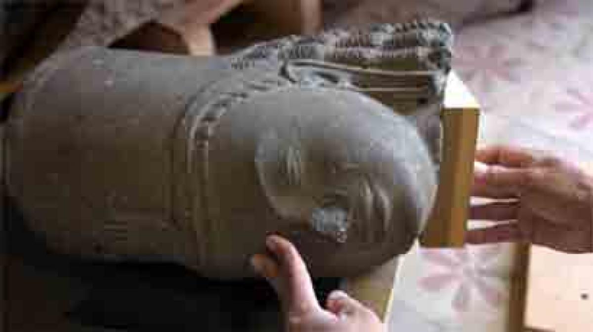 France returns head of Hindu statue taken 130 years ago