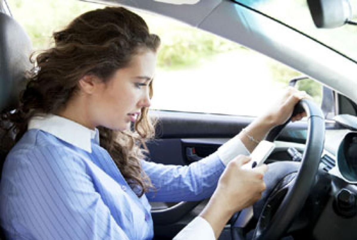 Young drivers using phones despite knowing dangers