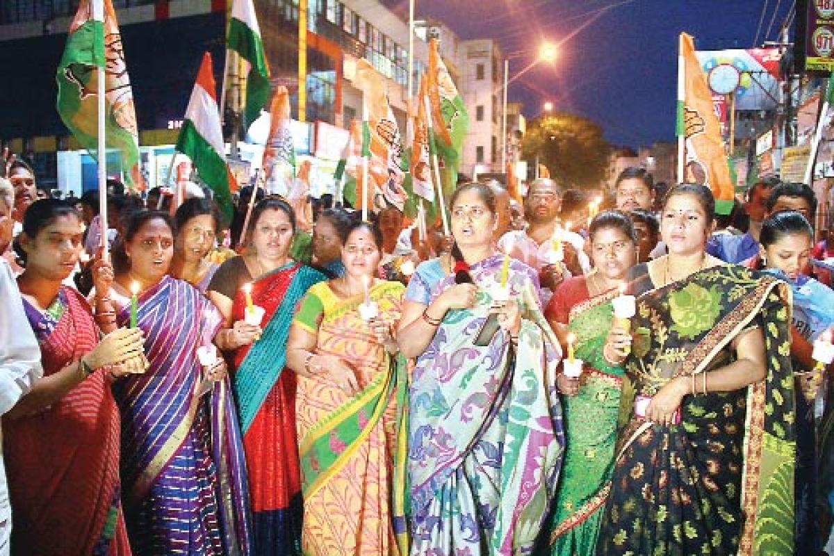 Candlelight rally for special status held